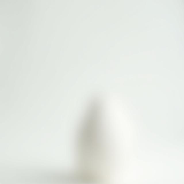 A textured white ceramic aroma diffuser